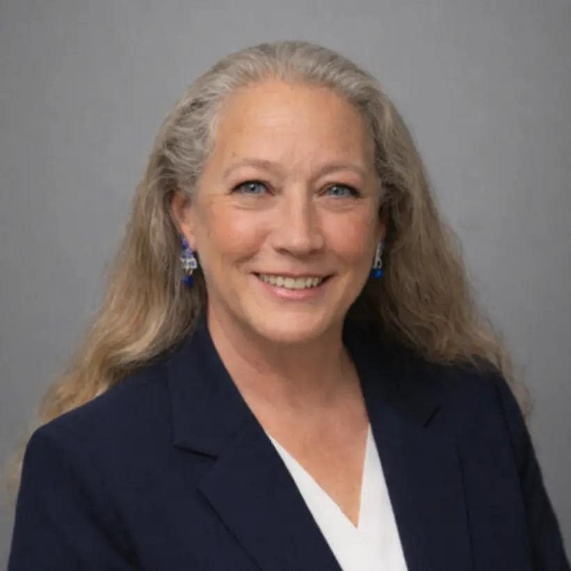 Milissa Wilson, Broker Associate with Homestead & Ranch Real Estate, in a navy blazer