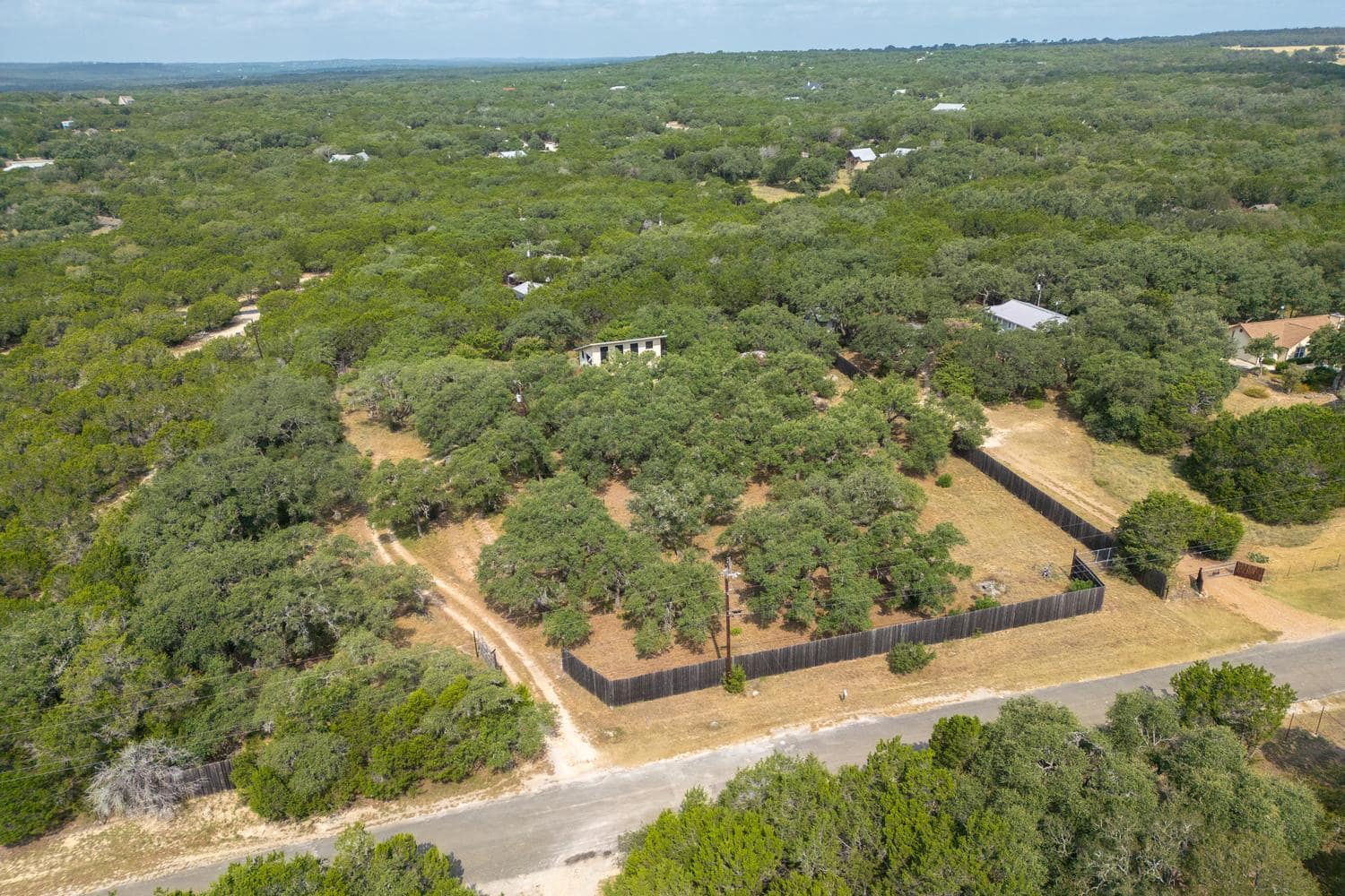 500 Ridge Oak Drive: the house among live oaks